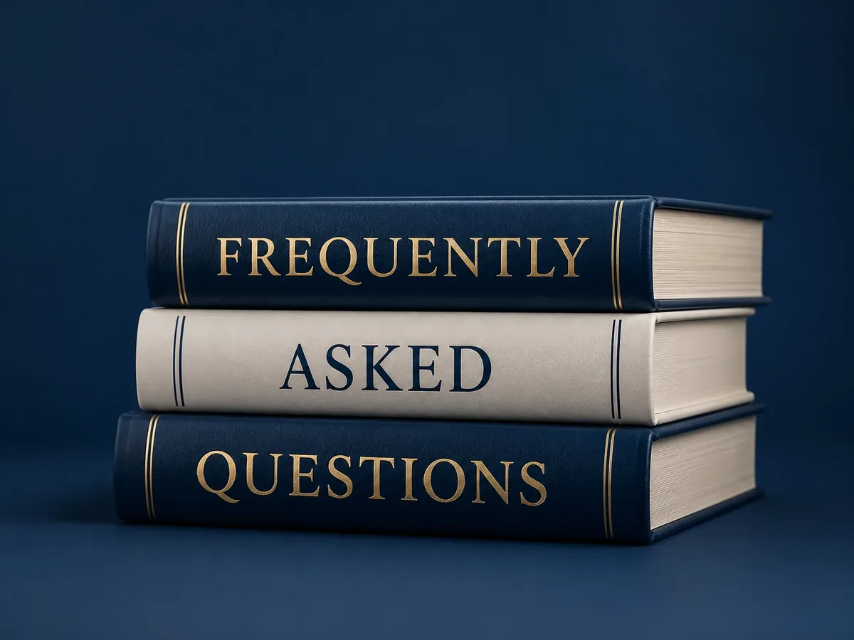 Frequently Asked Questions embossed on the spines of three stacked books